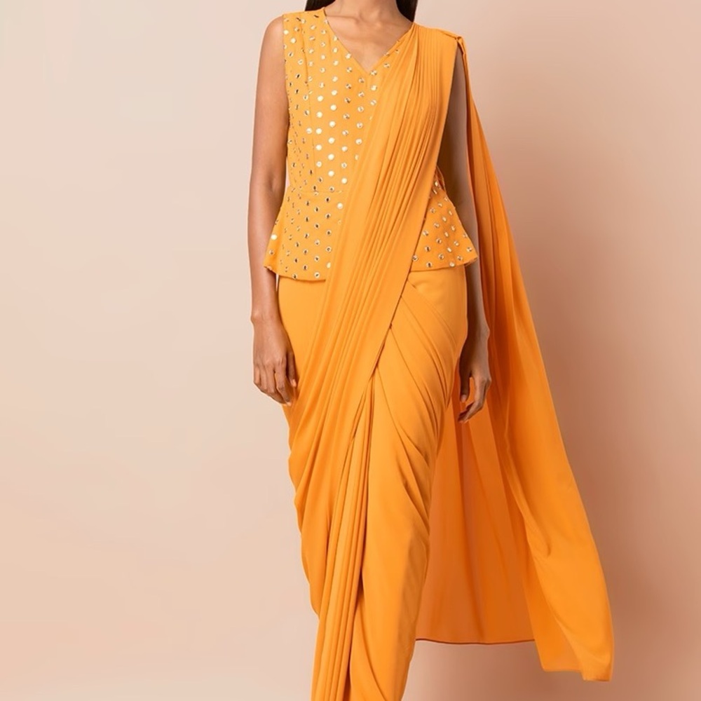 Elegant Orange Sari with Embellished Blouse